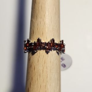 Simplistic and Dreamy Garnet CZ on Rhodium 360 crown